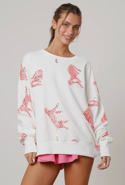 Ivory and coral sequin cheetah pullover