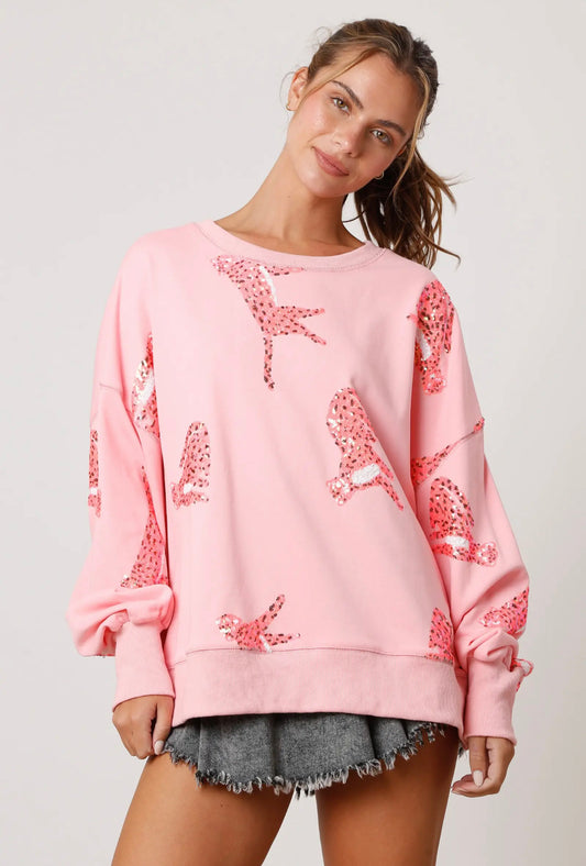 Blush pink and coral sequin cheetah pullover