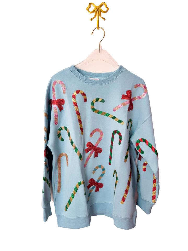 BLUE CANDY CANE & BOW PULLOVER RTS