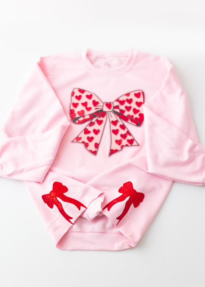 Pink Sequin Heart Bow Pullover with side bows