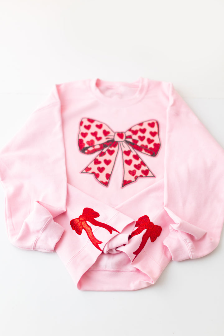 Pink Sequin Heart Bow Pullover with side bows