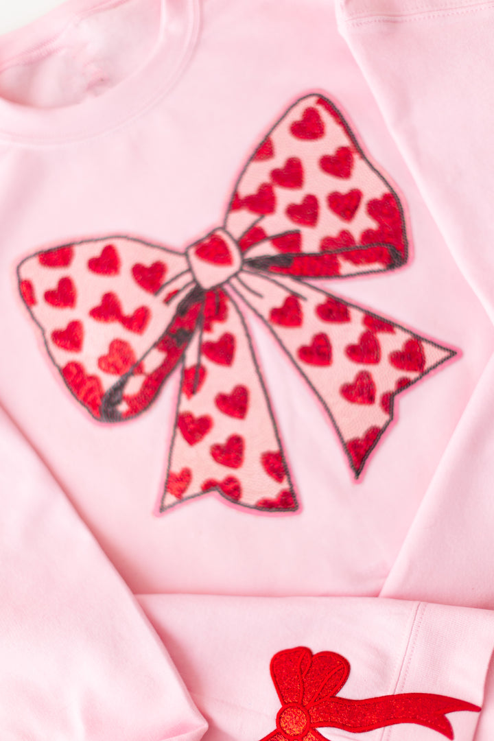 Pink Sequin Heart Bow Pullover with side bows