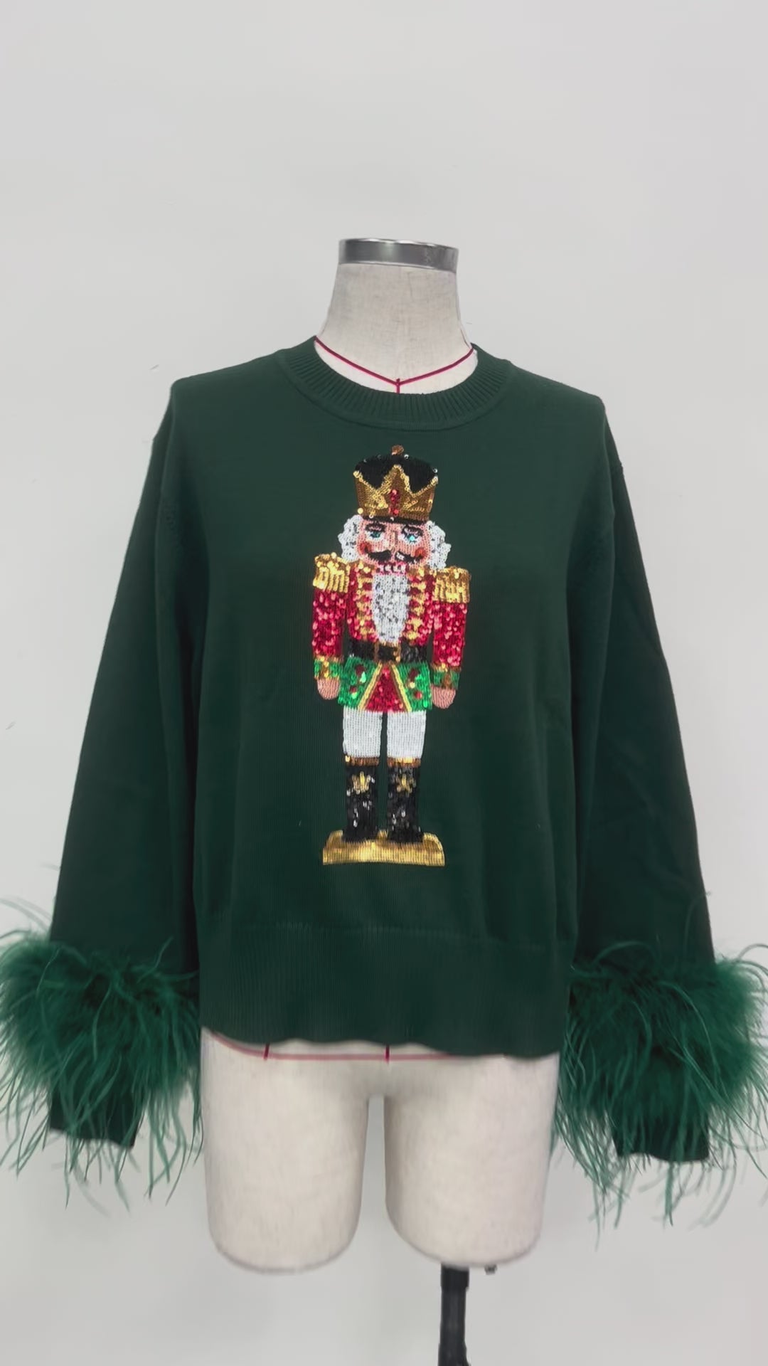 NUTCRACKER NIGHTS GREEN FEATHER SWEATER (PREORDER)